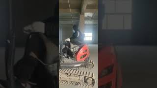 OULIDE mini excavator for indoor demolition work - demolishing  the concrete in the building.