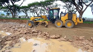 CATERPILLAR 140M motor grader working spreading soil for Road construction and Dump truck  working