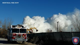 Laval | Incendie majeur d'une montagne de débris au centre Multi-Recyclage