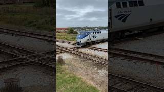 Amtrak train going fast through Plant City Fl