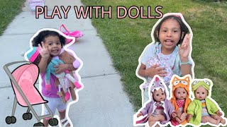 TAKING DOLLS ON A WALK