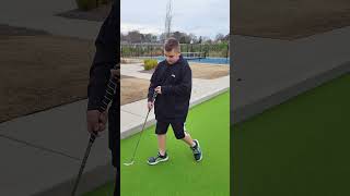 On the putting green. Practicing that swing. #golfswing #golf #specialneeds #golfer