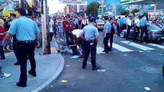 Philly Cop Sucker Punches Lady at Puerto Rican Day parade