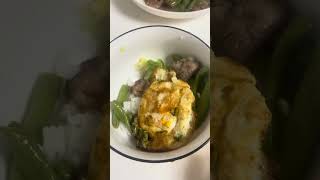 fried eggs,cabbages,green beans and meat ,rice