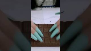 asmr-tapping and scratching on chocolate🍫 #asmr #tingles #tapping #scratching #shorts