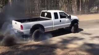 Ford 7.3 burnout! Rolling coal and doing doughnuts