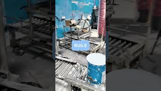 Wall Paint Filling,Capping &Palletising Machine.