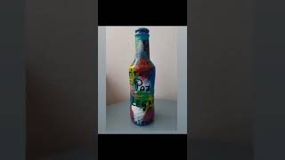 Botellas de vidrio pintadas a mano. Artesanía Nueva Tierra.