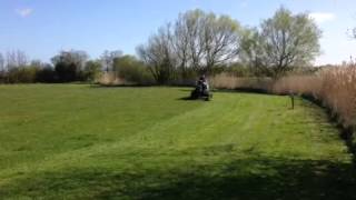 John mowing the park