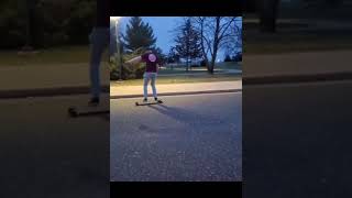 Longboard tricks with JUST A CURB | college parking lot edit