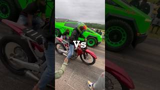 Tesla cyber truck racing against a dirtbike wow #automobile #race #cybertruck #tesla @MadMaxC7