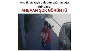 "Ana iki azyaşlı övladını sığınacağa ataraq qacdi "Anbaan görüntüləri buyurun izləyin.