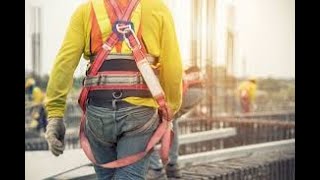 How to properly put on a safety harness before working at heights