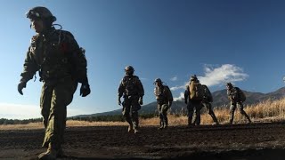 US Recon Marines Conduct fee fall parachute jump training