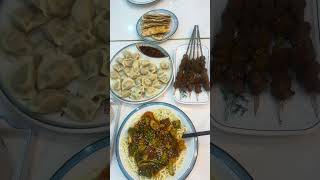 Lamb kebabs,beef noodles,beef dumplings,bread, muslin restaurant