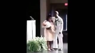 Navy dad surprises daughter at elementary school graduation