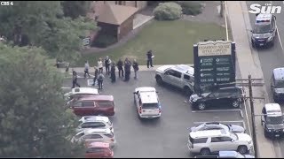 Man g uns down four people, including two children, outside Colorado dentist office and flees