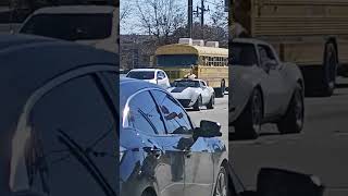 White Chevy Corvette.