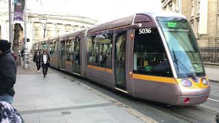 Perfect timing two LUAS Tram's pass each other in Dublin City IRELAND