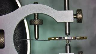 How to test a balance wheel for flatness and the balance pivots for straightness. (Quick Tip) Part 1