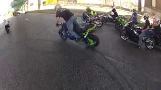 Grom stoppie on Highway 64 St. Louis on Crack Whore Motorcycle Ride 2015