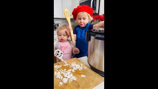 Adam and his little sister make dinner