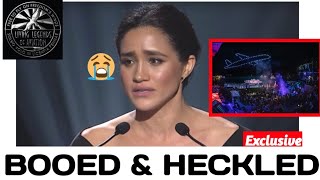 See How The Crowd BOOED & HECKLED Meghan Off the Stage durx Her Speech; "GET DOWN MEG" at the L.L.A.