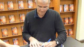 Lt. Col. Oliver North at a book signing - TopSignatures.com