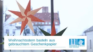 Weihnachtsstern basteln aus gebrauchtem Geschenkpapier