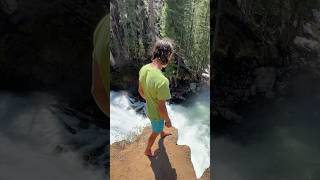 CRAZY TRIPLE FLIP INTO A RAGING WATERFALL