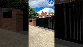 Who says fences can't be fabulous? Get ready to turn heads with our sleek black satin sliding gate!