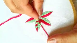 Hand embroidery of a flower in two shades with cotton thread