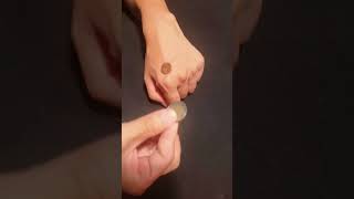 Coin Magic Penetration - Lucky Cent through hand #cointricks #magichands