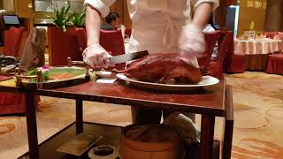 How to serve, duck  on Beijing style in chinese restaurant. Shenzhen, China