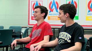 Identical twins with identical GPAs serve as co-valedictorians