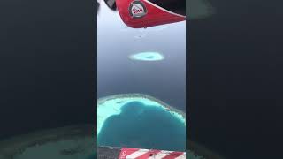 Seaplane travel in the Maldives with landing at the Conrad Hilton.