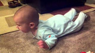 Elijah trying to crawl - Sept 30