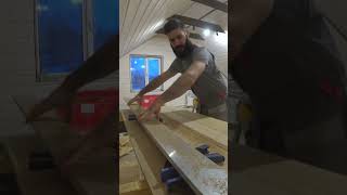 Sawing wood.Пилит дерево.