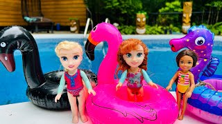 BARBIE - ELSA and ANNA toddlers POOL FUN ! - floaties race - fun challenge - water slide  - splash