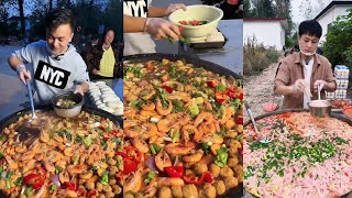 caring Chinese guy Cook Free Meals for the Old Guys in a Village