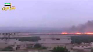 20130529 Idlib سرمين Fire rages on a farmland after rebels set it ablaze to starve defiant Syrian vi