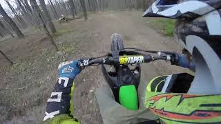 Riding a Kx112 in the woods