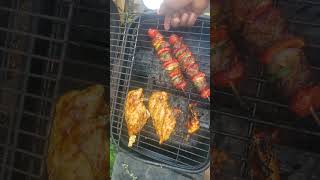 grilling AAA steak skewers and marinated chicken breats on propane fire!