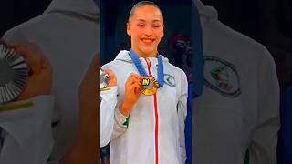 accepting a medal in the country that let her down