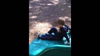 Liam down a slide