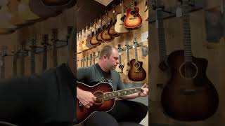 Joe finger picking a quick tune on the PRS PE20 parlor guitar.￼