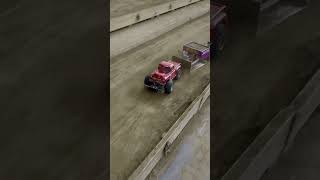 Modified 4 wheel drive RC truck and a car pulling at the Nationals