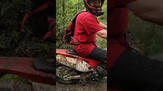 Honda dual sports jumping, climbing, hopping, falling, repeating.