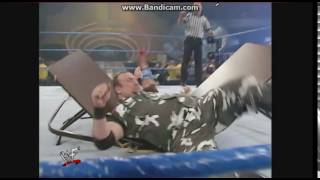 Kurt Angle olympic slams Bubba Ray Dudley through table