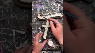 Painting Nails on String Art Sign